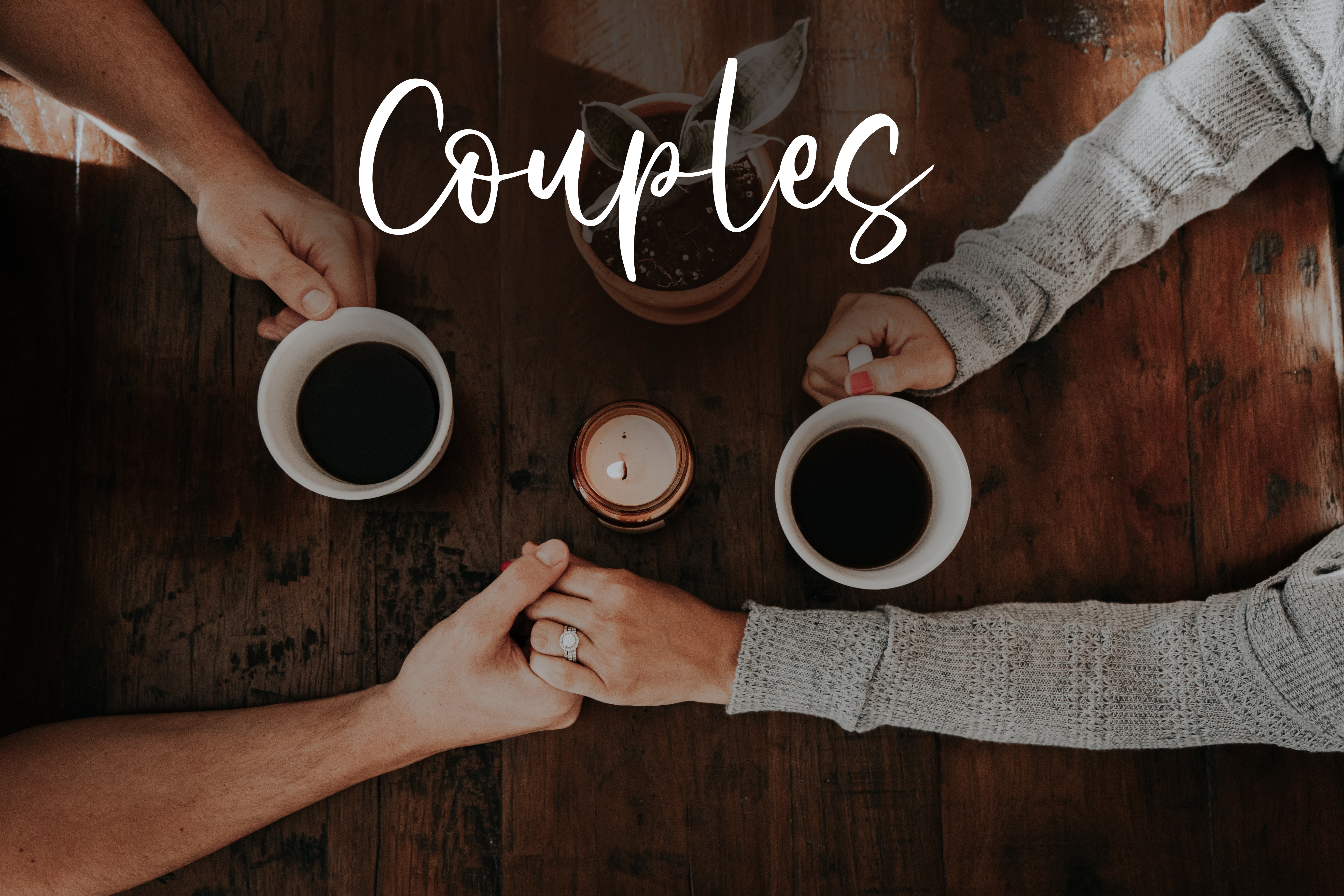 Couple holding hands